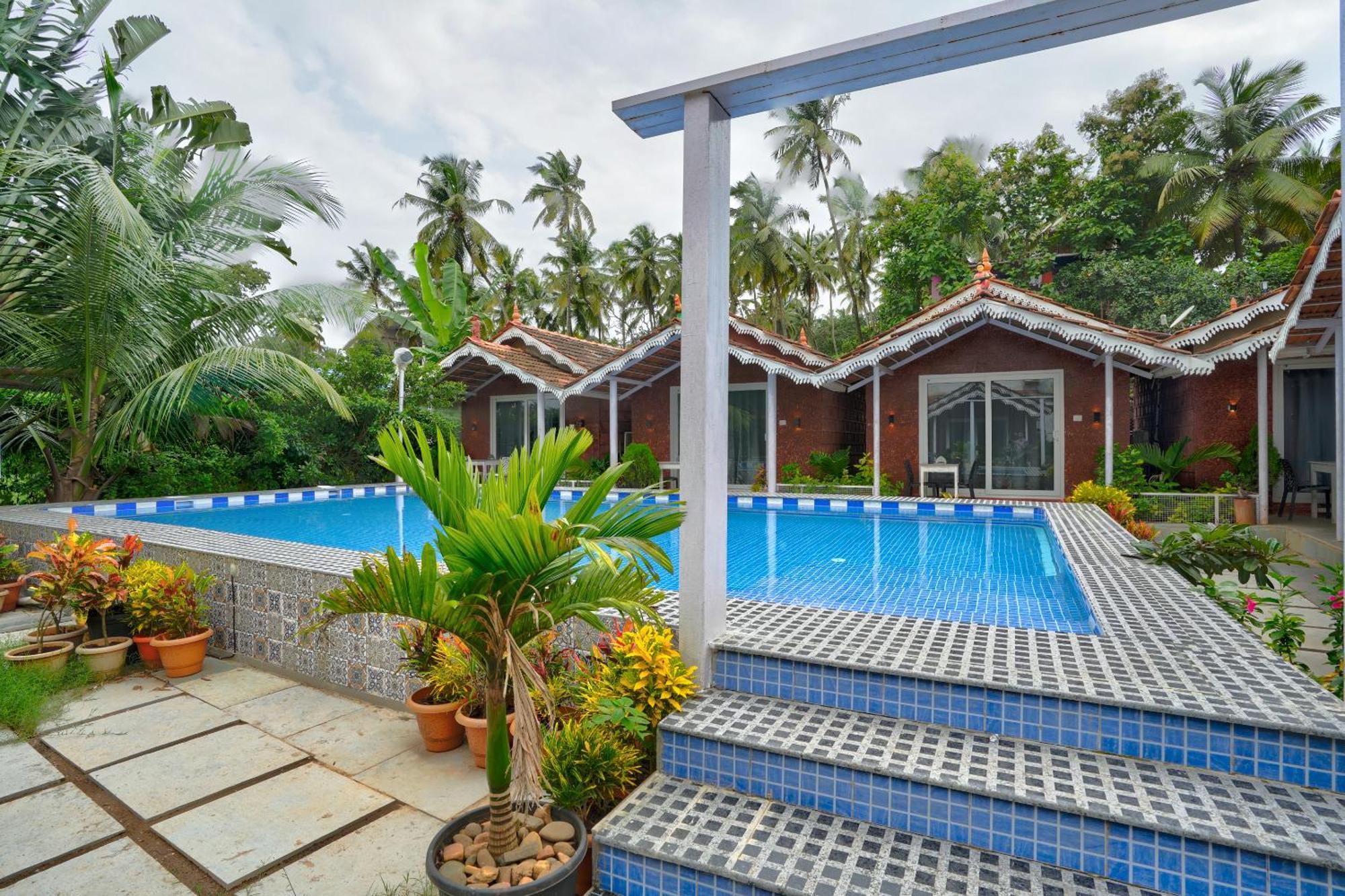 Golden Rice Resort & Cottages Candolim Esterno foto