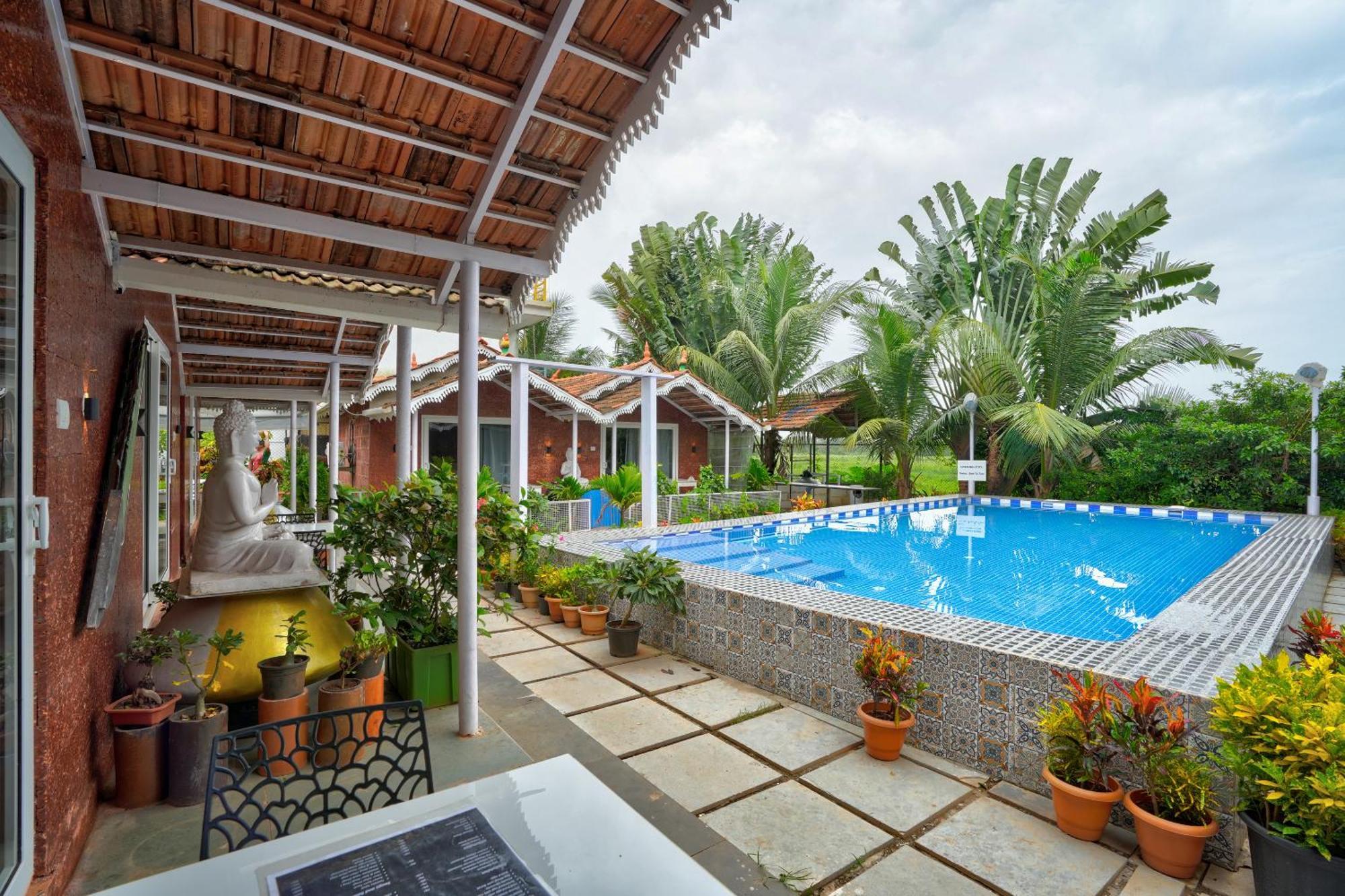 Golden Rice Resort & Cottages Candolim Esterno foto